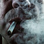 A hyperrealistic photograph depicting the consequences of smoking on oral health.