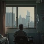 An individual in a hospital room, suffering from smoking-related illnesses with a Kuala Lumpur skyline in the background.